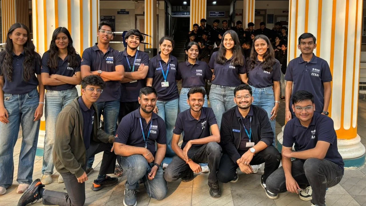 Praxis team members posing together outside the venue
